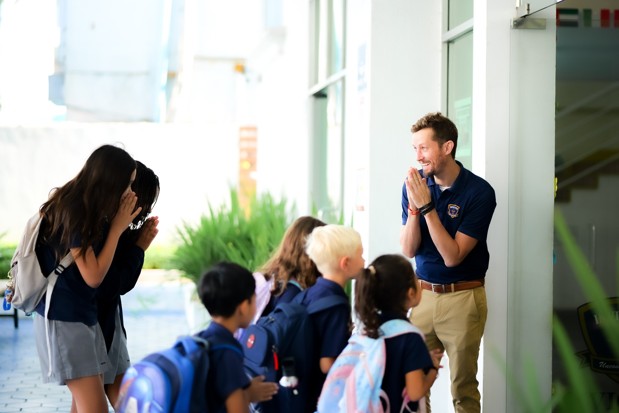 Invictus Teachers Welcome Students.JPG